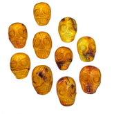 Cognac Amber Carved Skull Cabochons